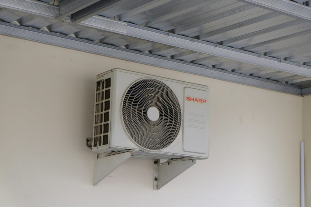 Split AC unit mounted on a residential wall